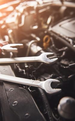 mechanic-hand-checking-fixing-broken-car-car-service-garage (1)